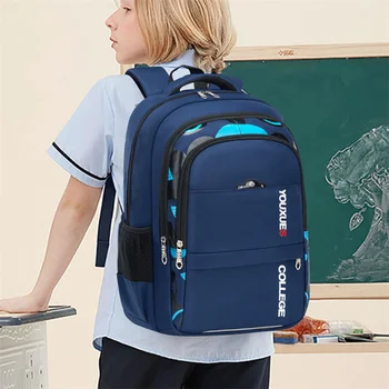 2023 Новые детские школьные сумки Детский рюкзак в начальной школьной сумке для мальчиков-подростков Водонепроницаемые рюкзаки Сумка для книг Mochila